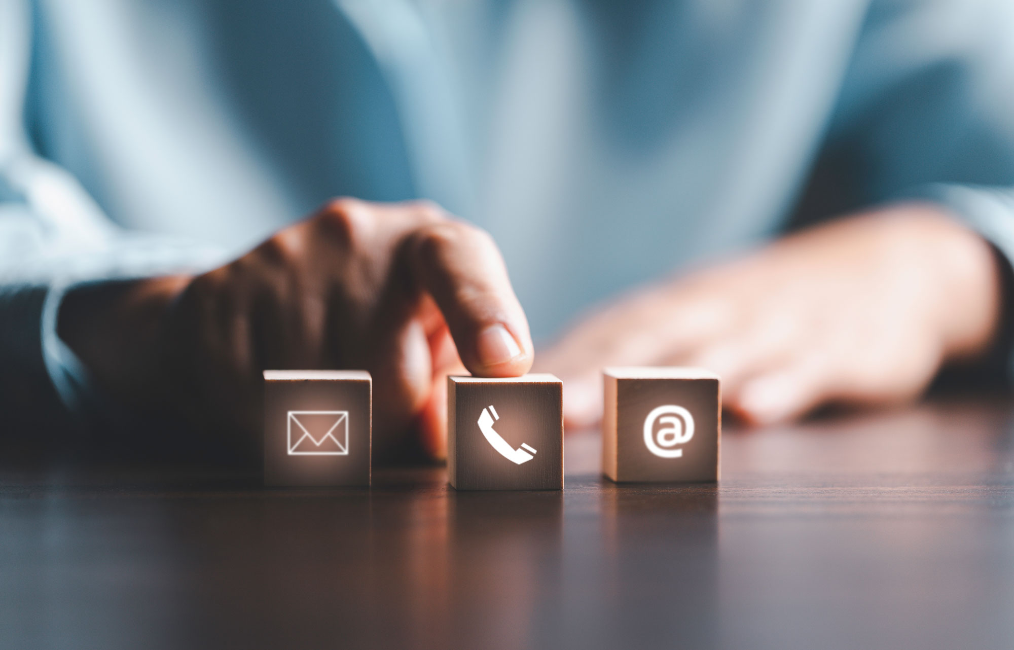 website page contact us email marketing concept customer support hotline contact us people connection cube wood with email call phone address chat message icons banner with copy space